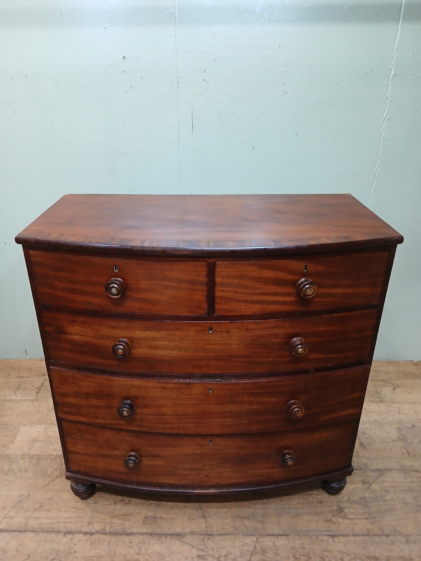 2 over 3 Georgian mahogany bowfront chest of drawers