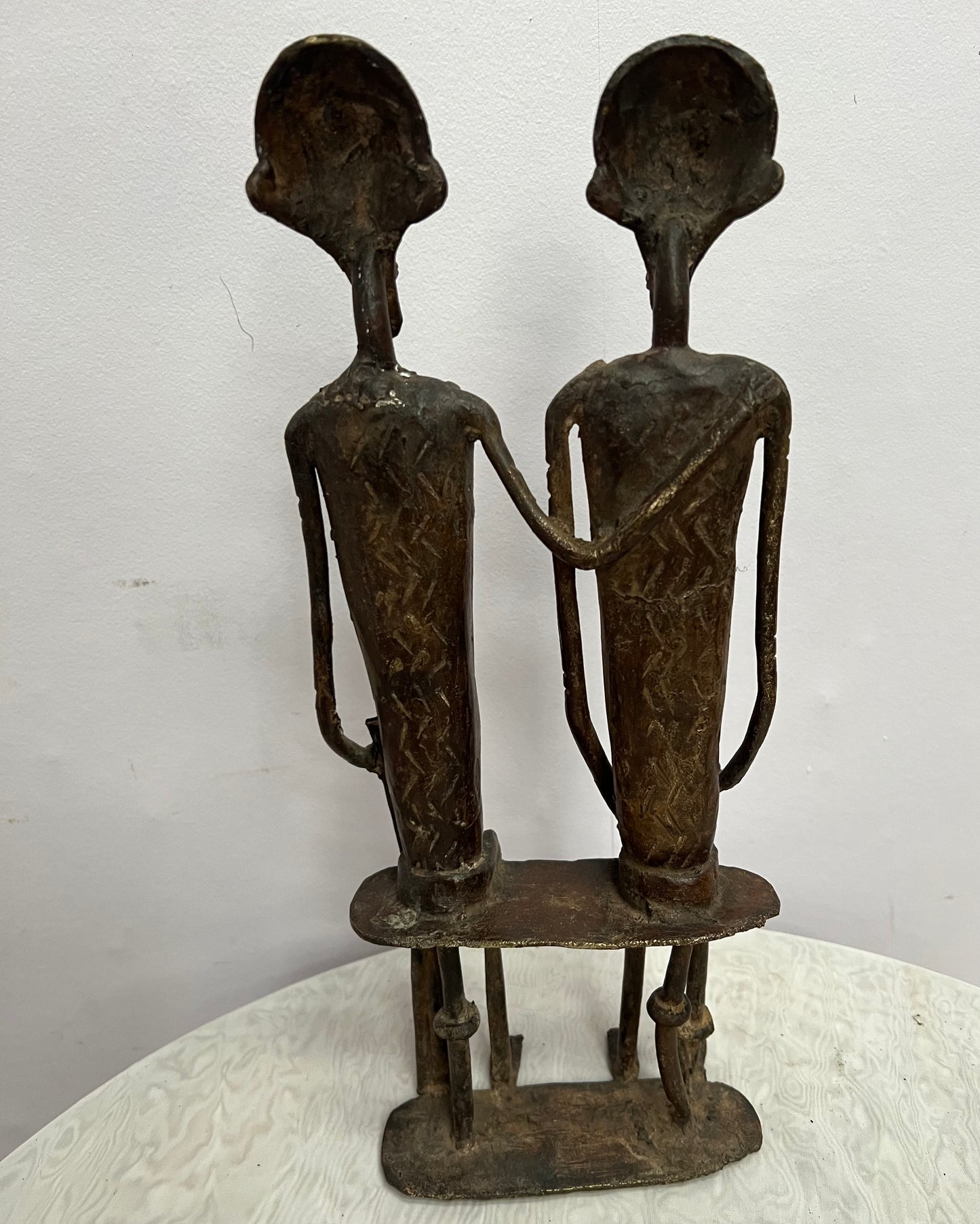 African Bronze statue of couple on bench