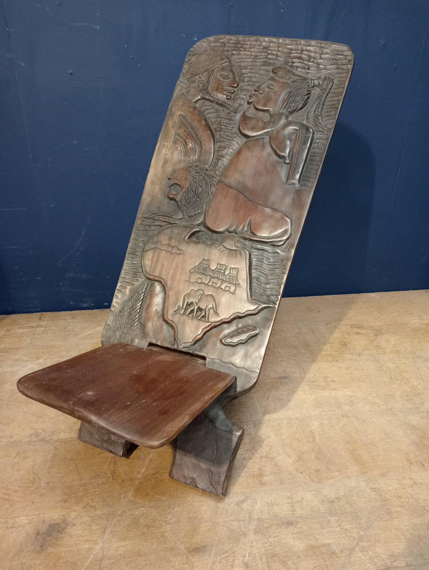 An African handmade wooden palaver chair