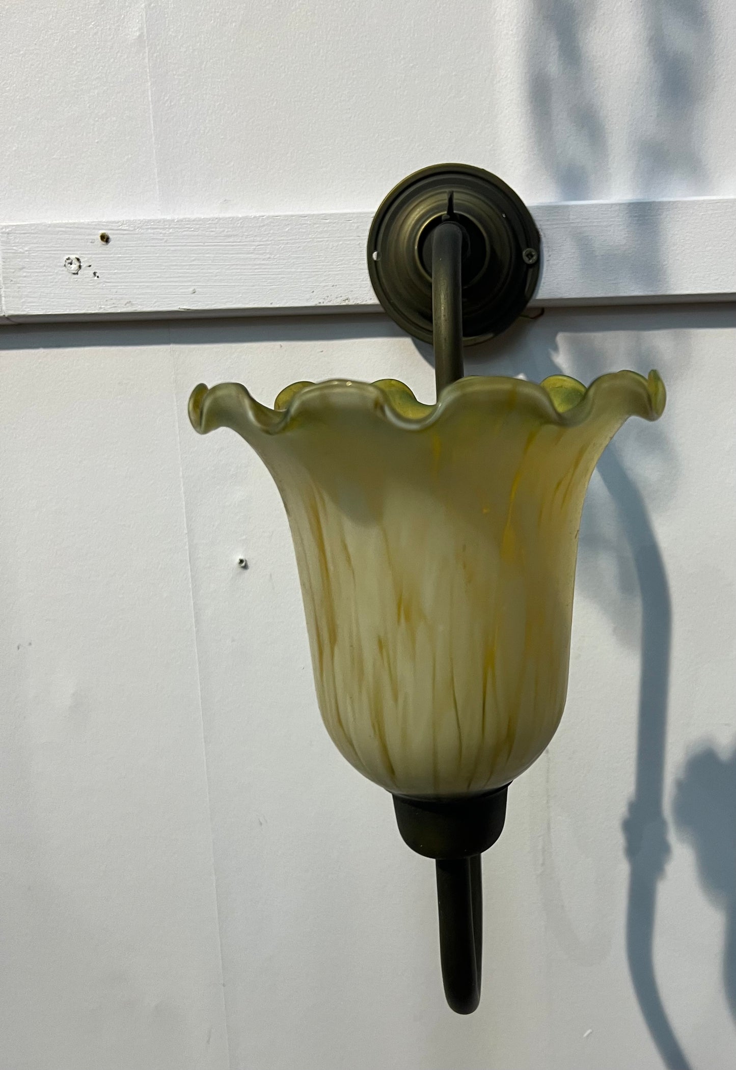 Antique brass  wall light with tulip shade