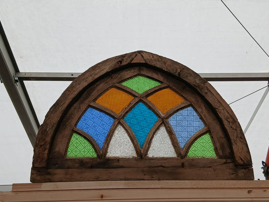 Arched stained glass fanlight window