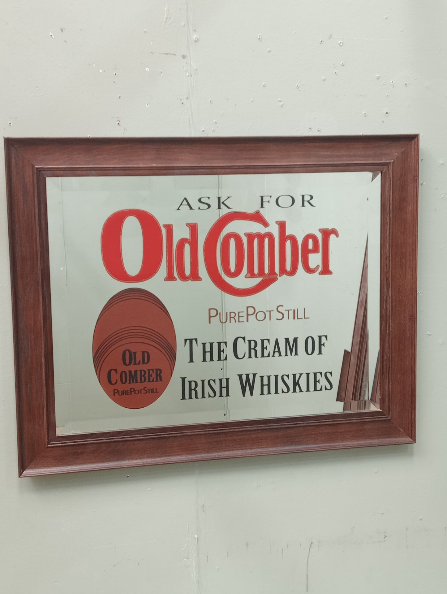 Ask for old Comber pure pot still the cream of Irish whiskies bevelled advertising mirror
