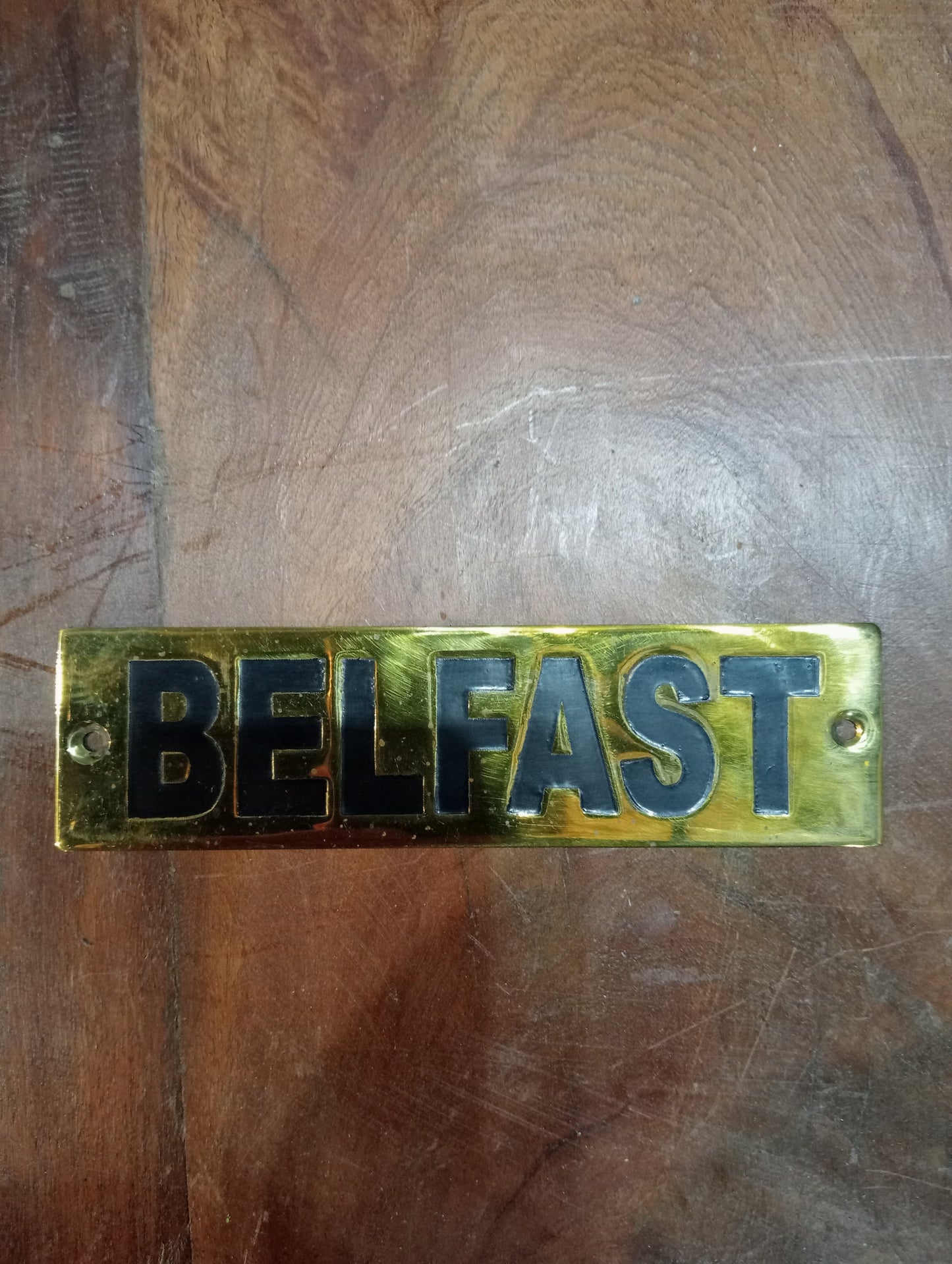 Belfast brass sign