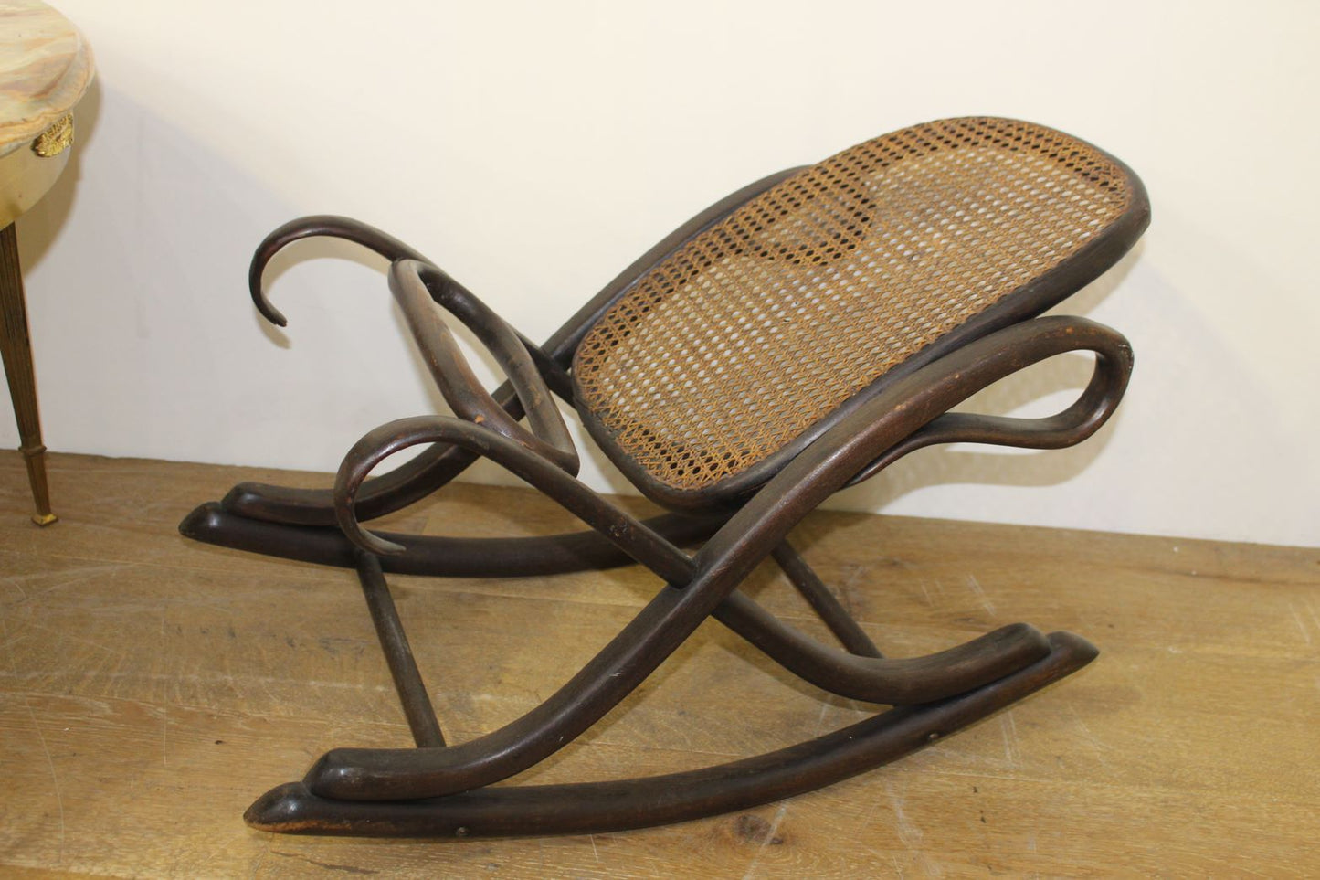 Bentwood rocking rattan footrest