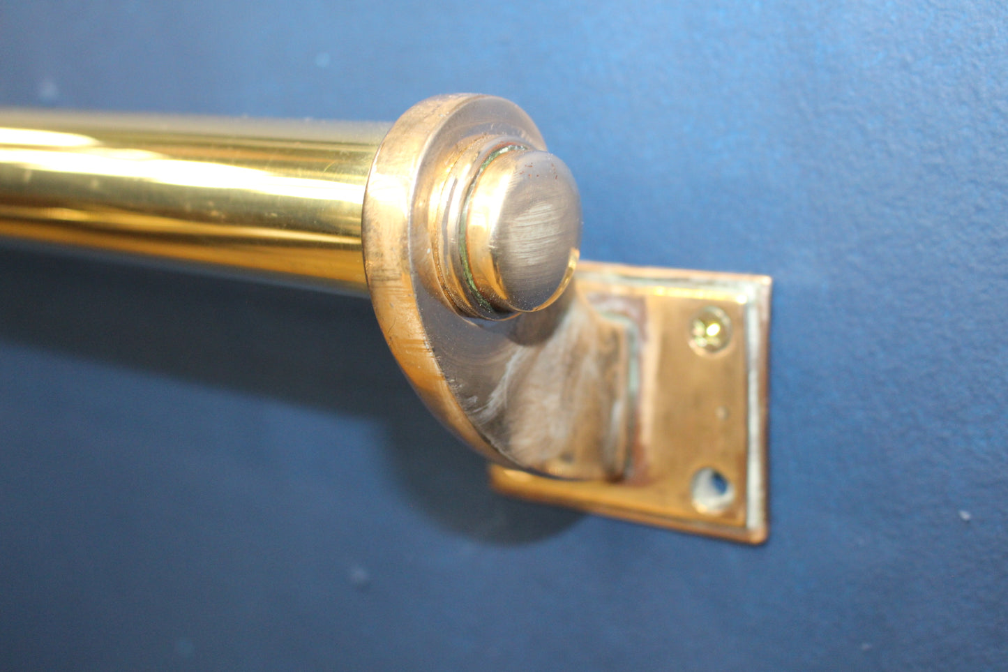 Brass door handle with bronze mount