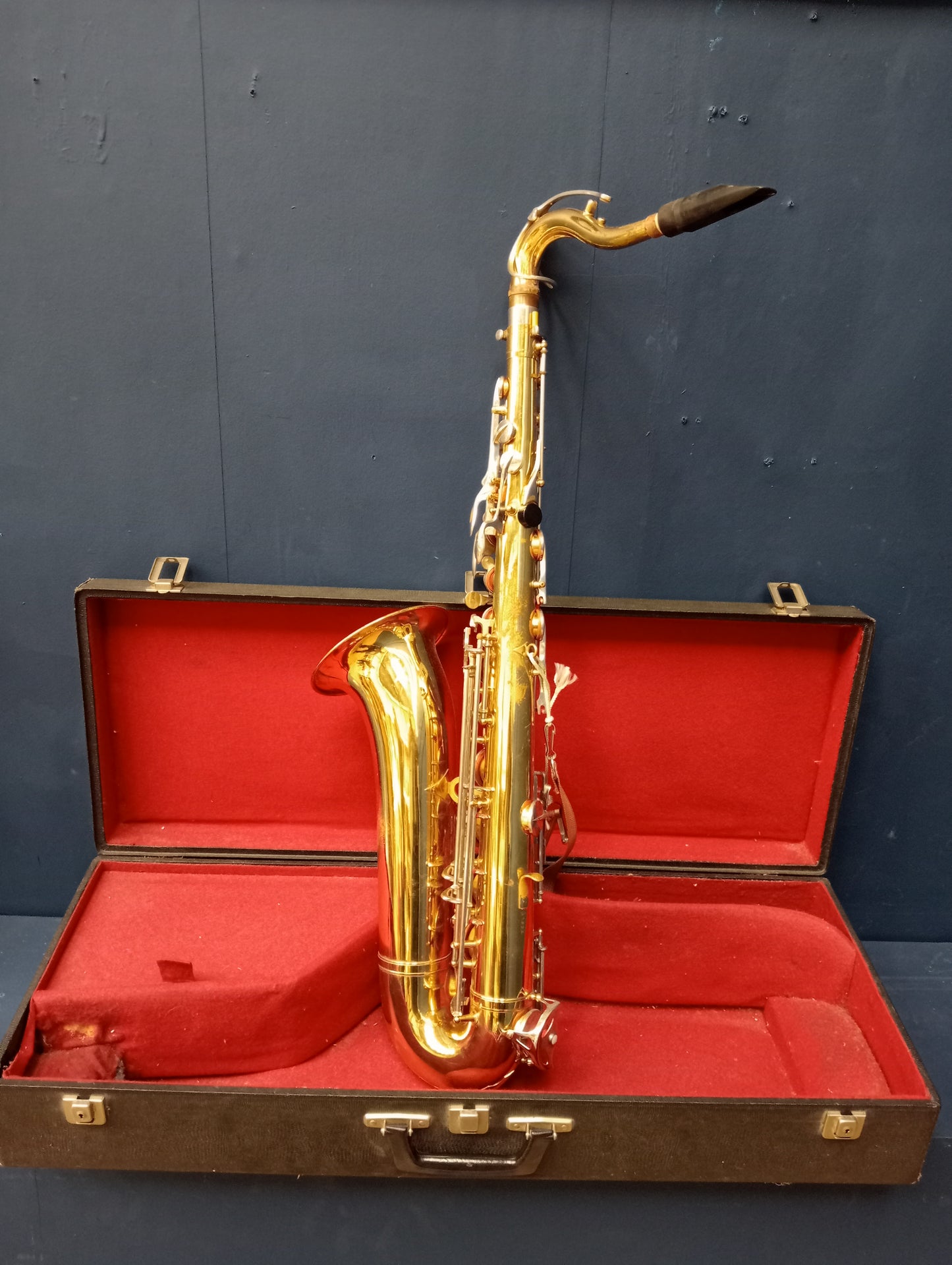 Brass saxaphone cased