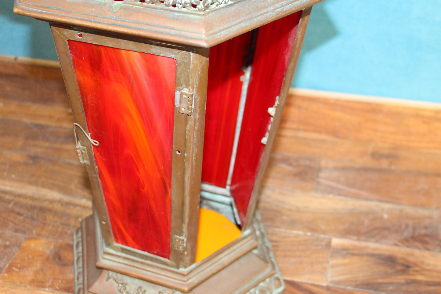 Bronze hanging lantern with red stain glass panels