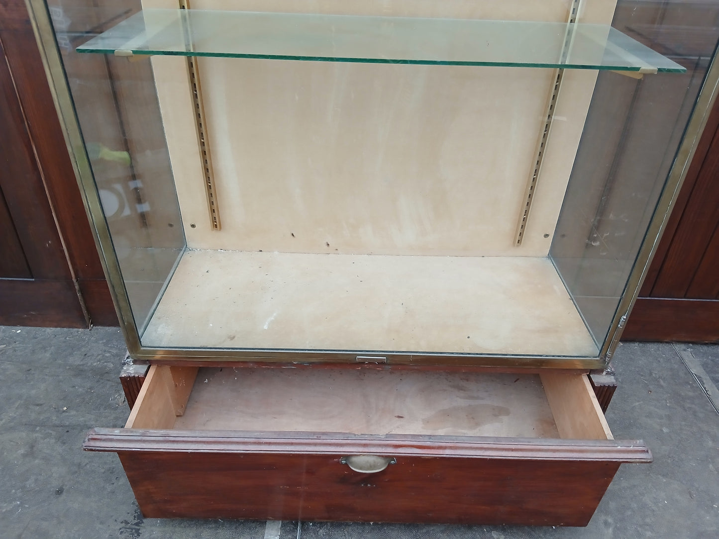 Bronze Pastry French glazed shop display cabinet featuring a single lower drawer on bronze feet