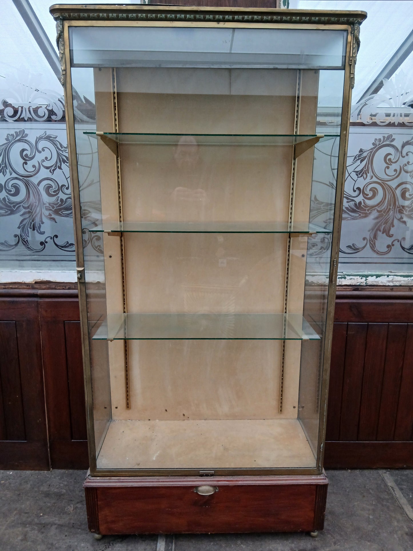 Bronze Pastry French glazed shop display cabinet featuring a single lower drawer on bronze feet