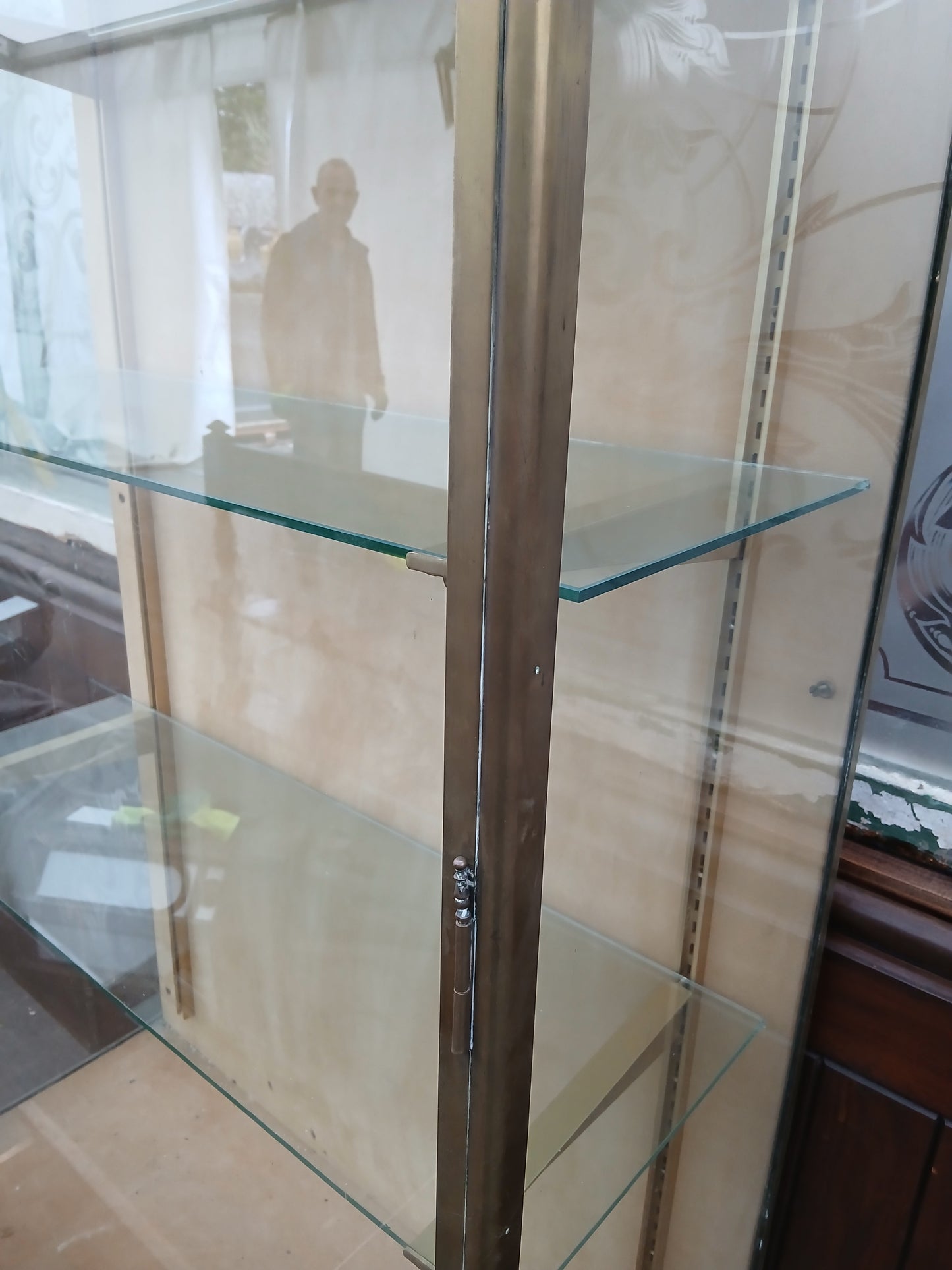 Bronze Pastry French glazed shop display cabinet featuring a single lower drawer on bronze feet