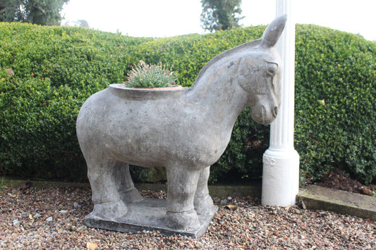 Carved stone foal sized donkey plantar