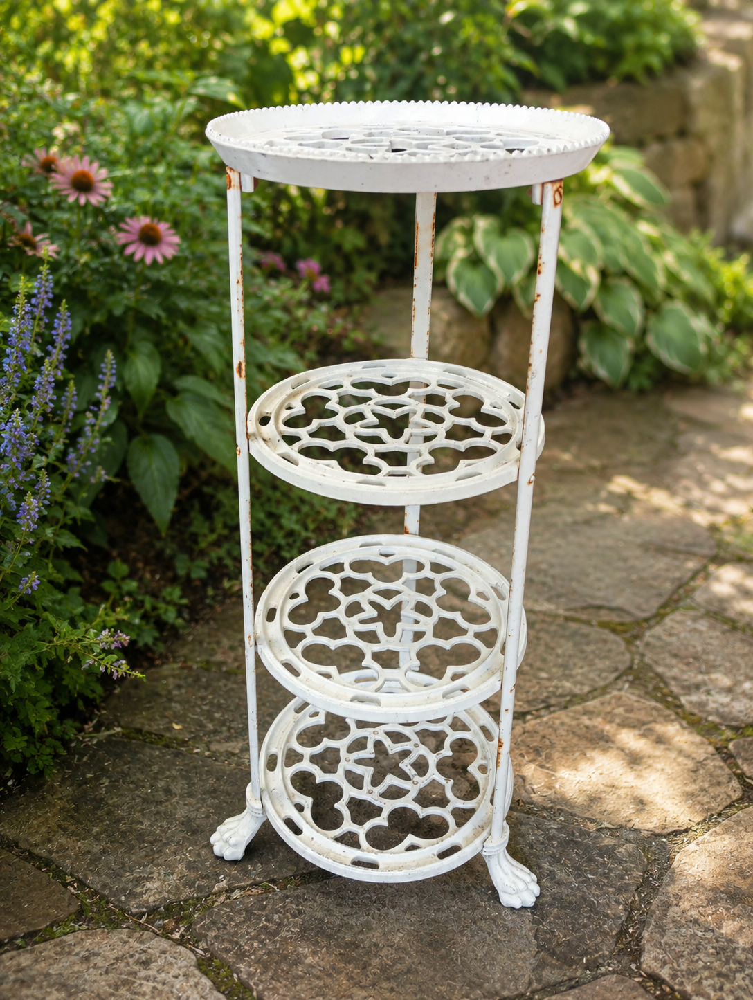 Cast iron 4 tier planter with claw feet