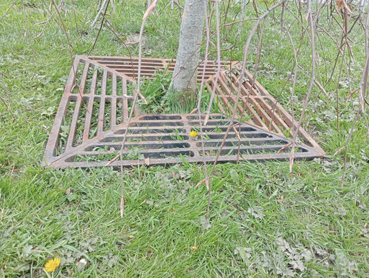 Cast iron tree surrounds each in four parts