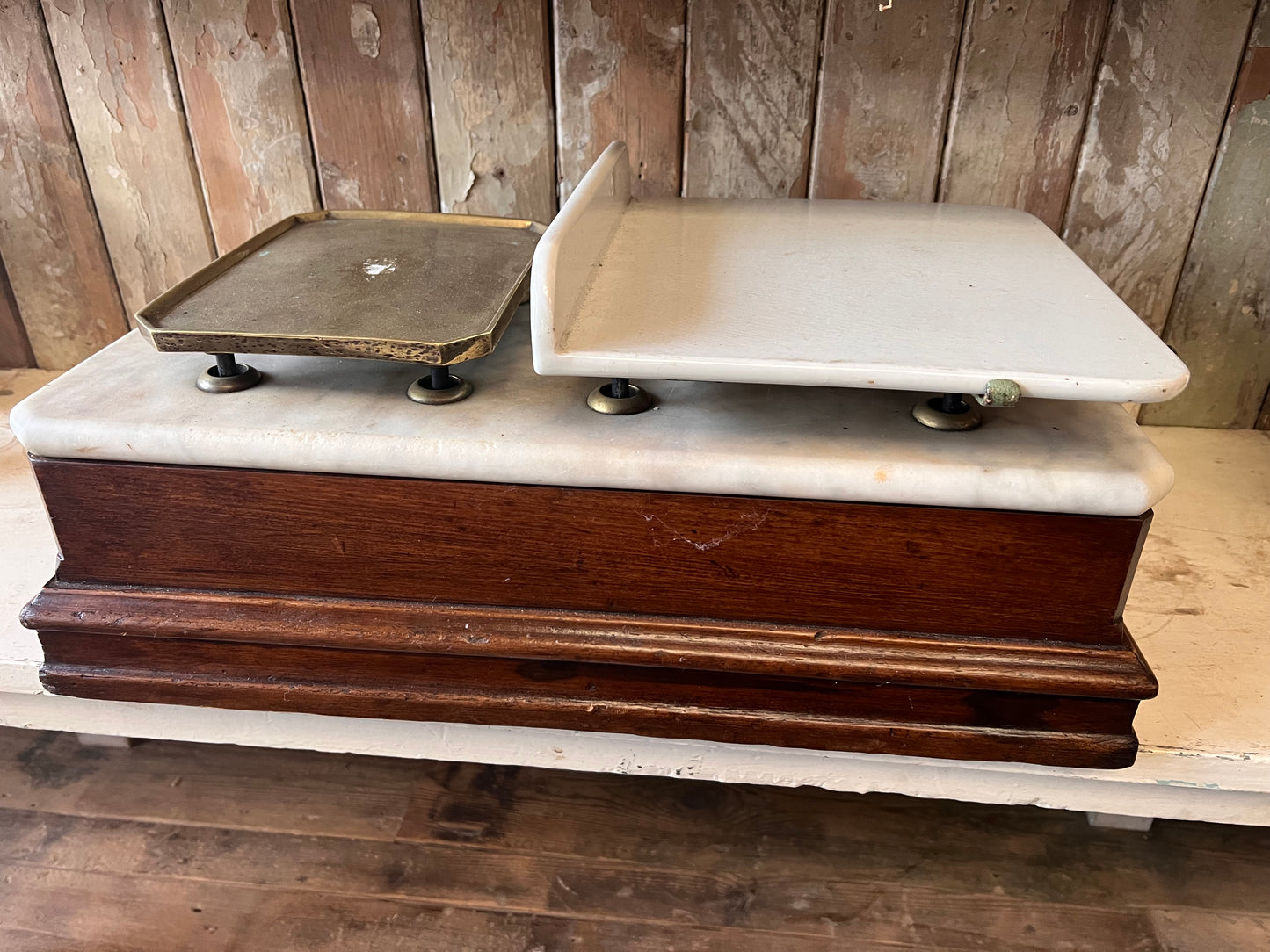 Cermaic and brass scales  with marble top and wooden base