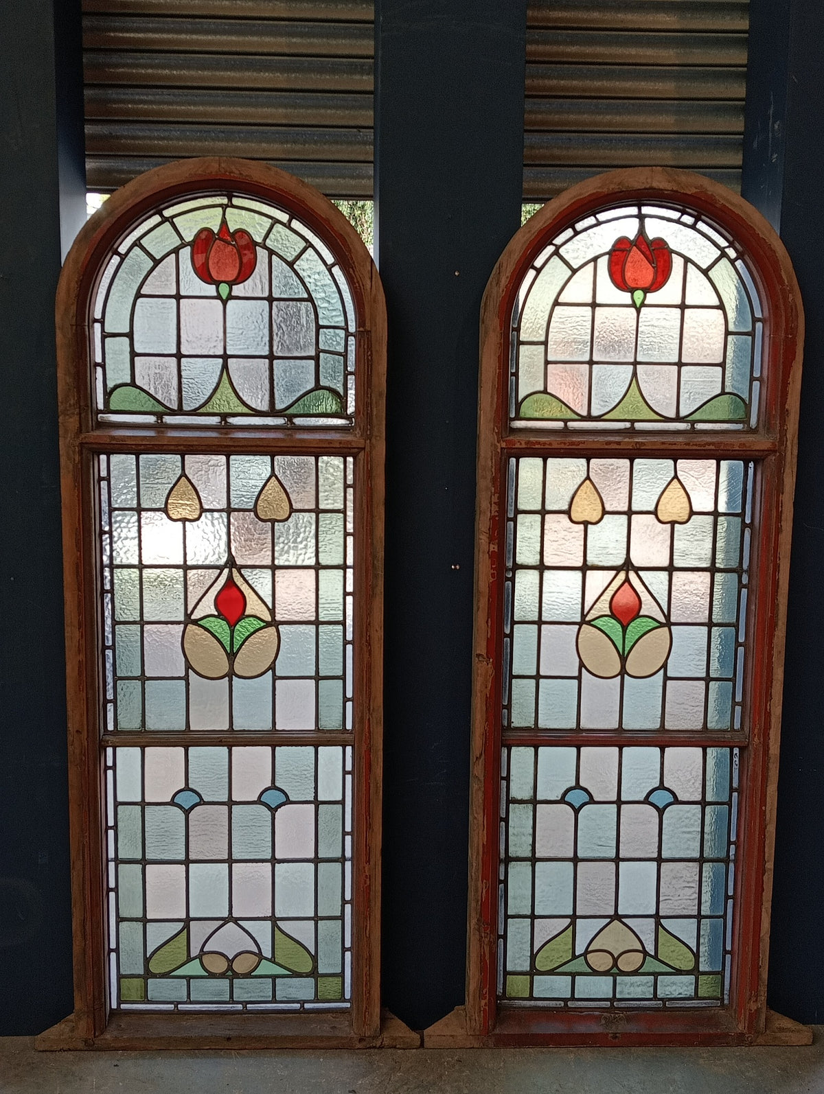 Pair of Reclaimed Arched Stained Glass Windows with Red Tulip Design
