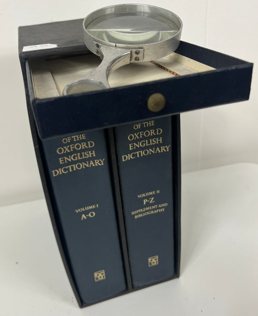 Compact edition english dictionary with magnifying glass