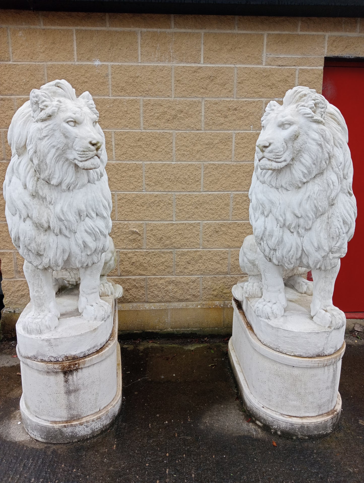 Composition stone lions and bases