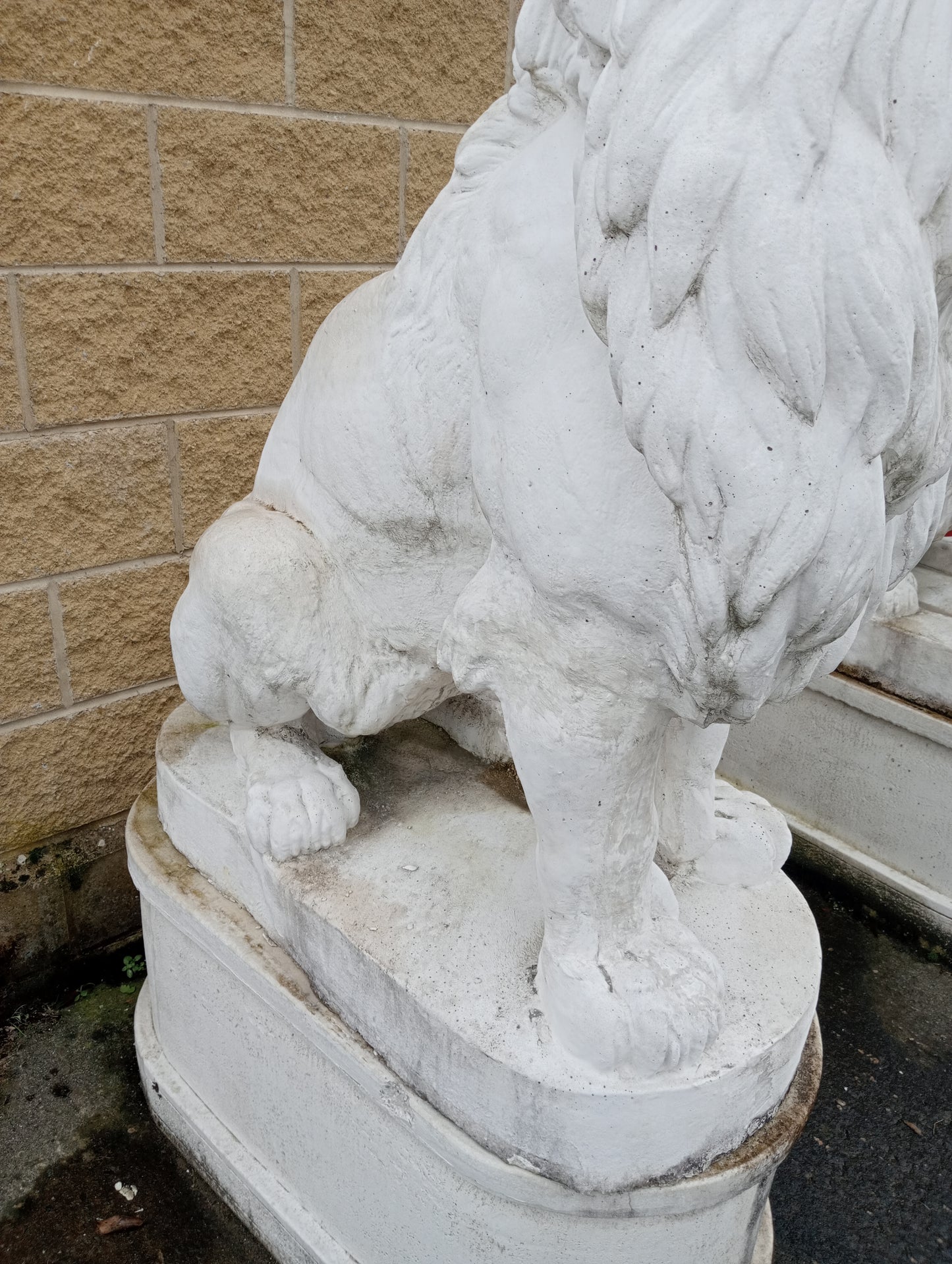 Composition stone lions and bases