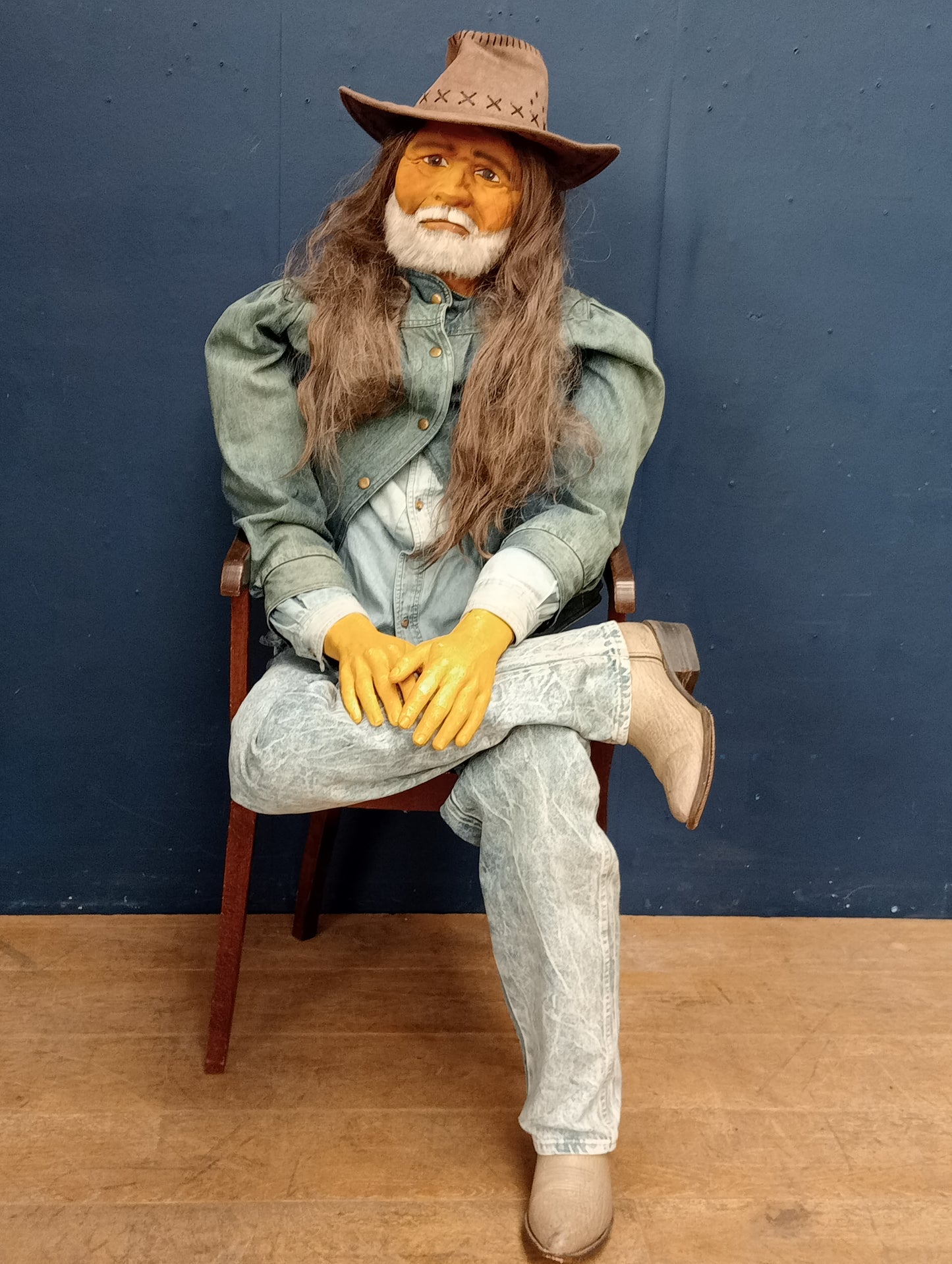 Cowboy figure seated