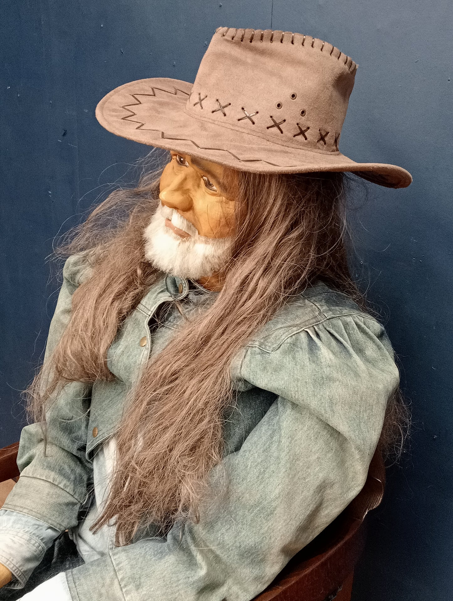 Cowboy figure seated