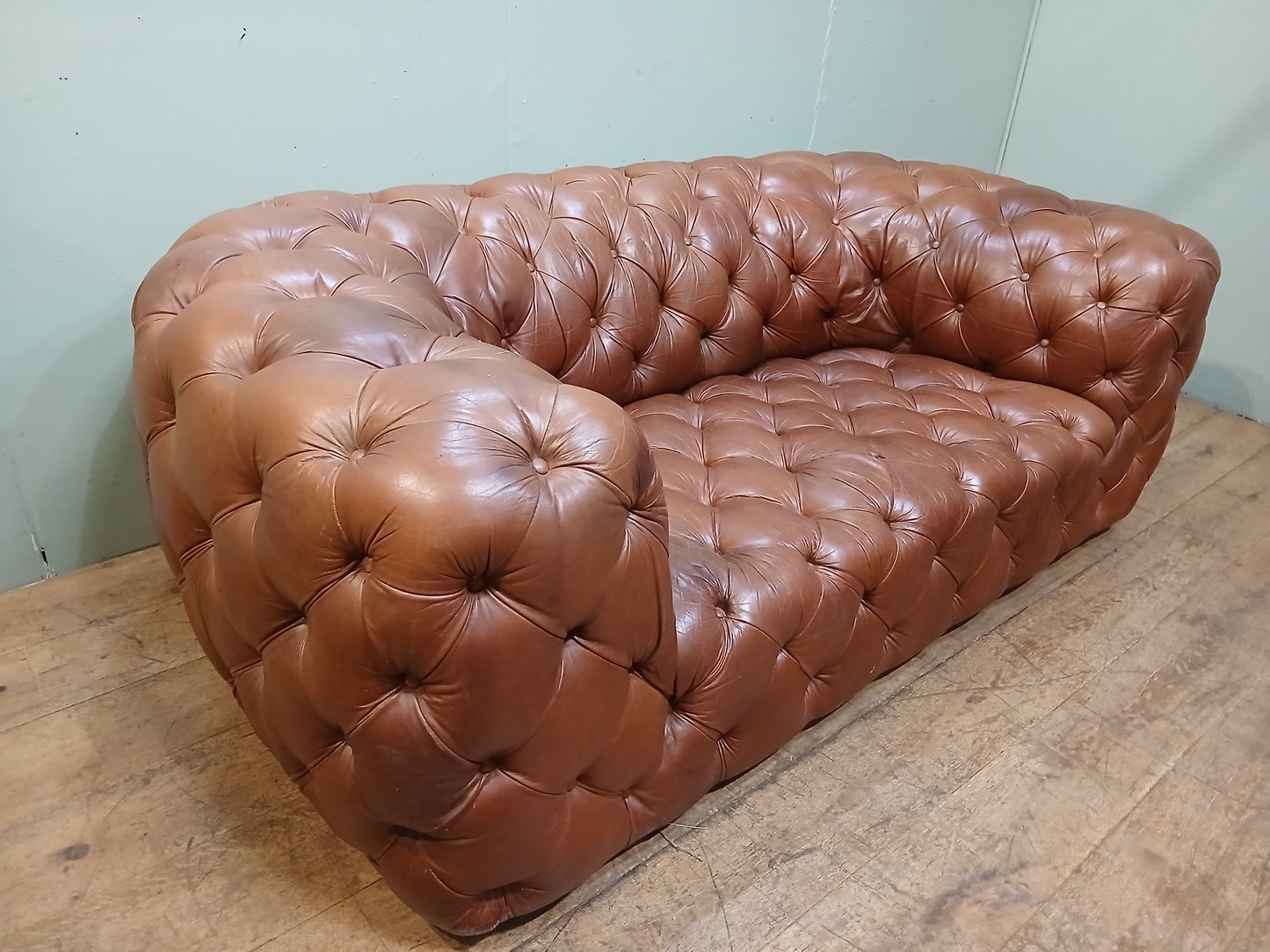 Deep buttoned Chesterfield sofa