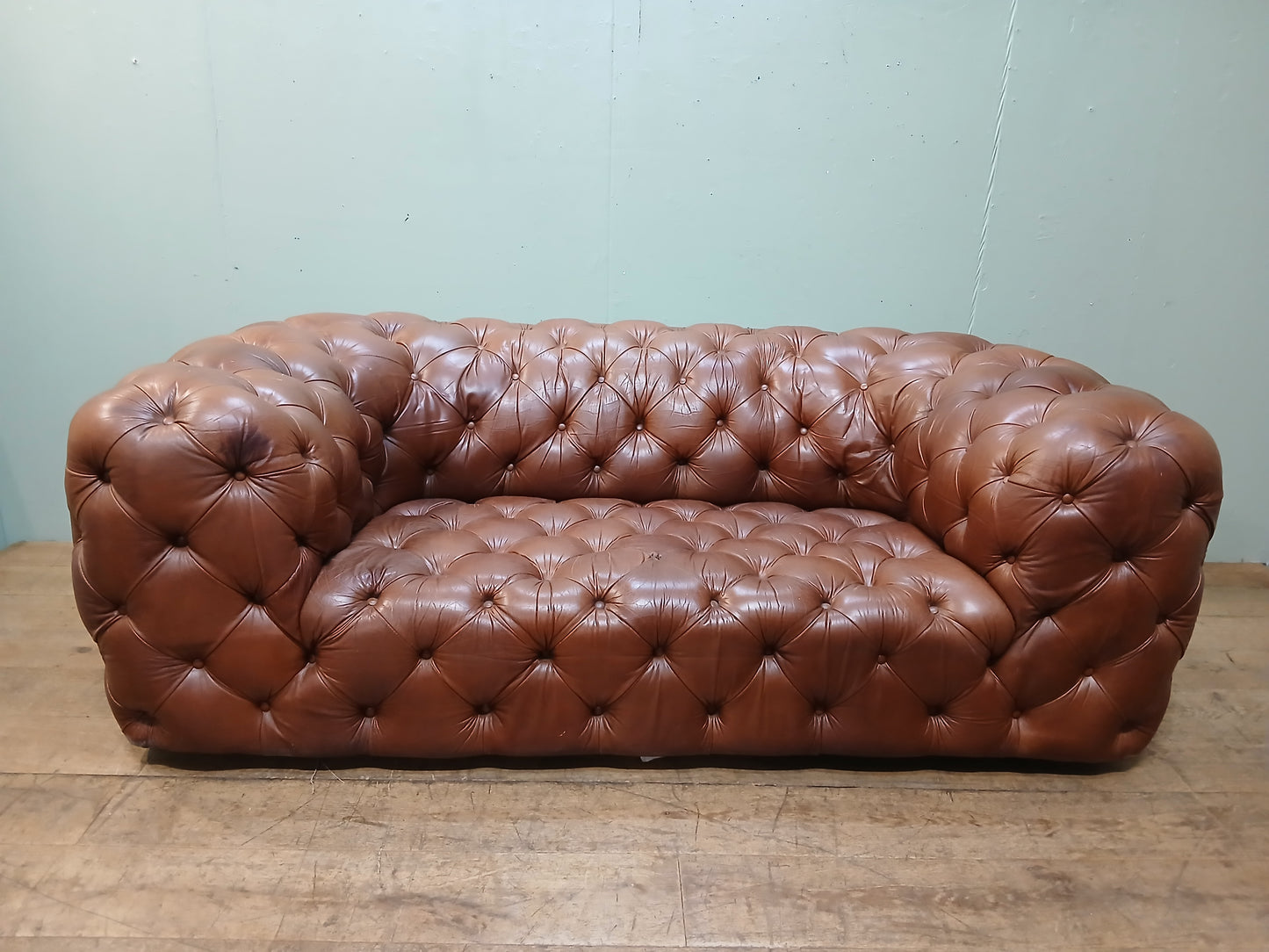 Deep buttoned Chesterfield sofa