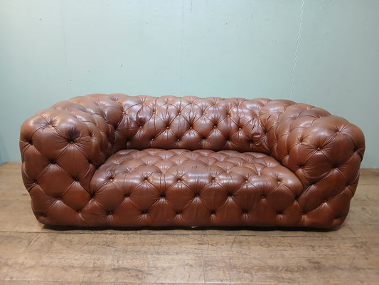 Deep buttoned Chesterfield sofa