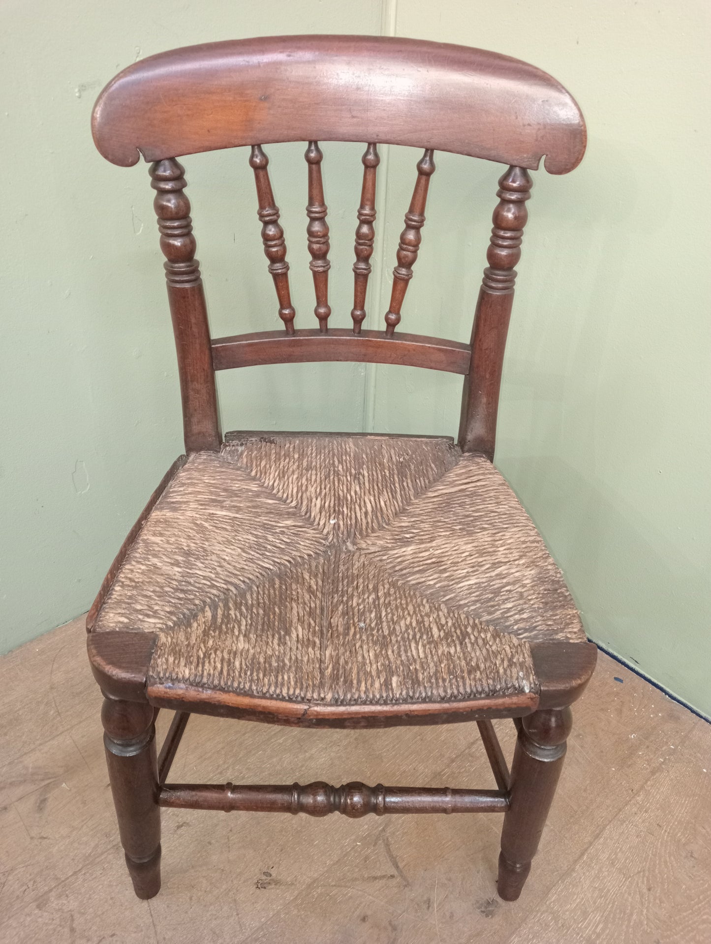 Early 19th C Elm spindle back chair with original rush seat