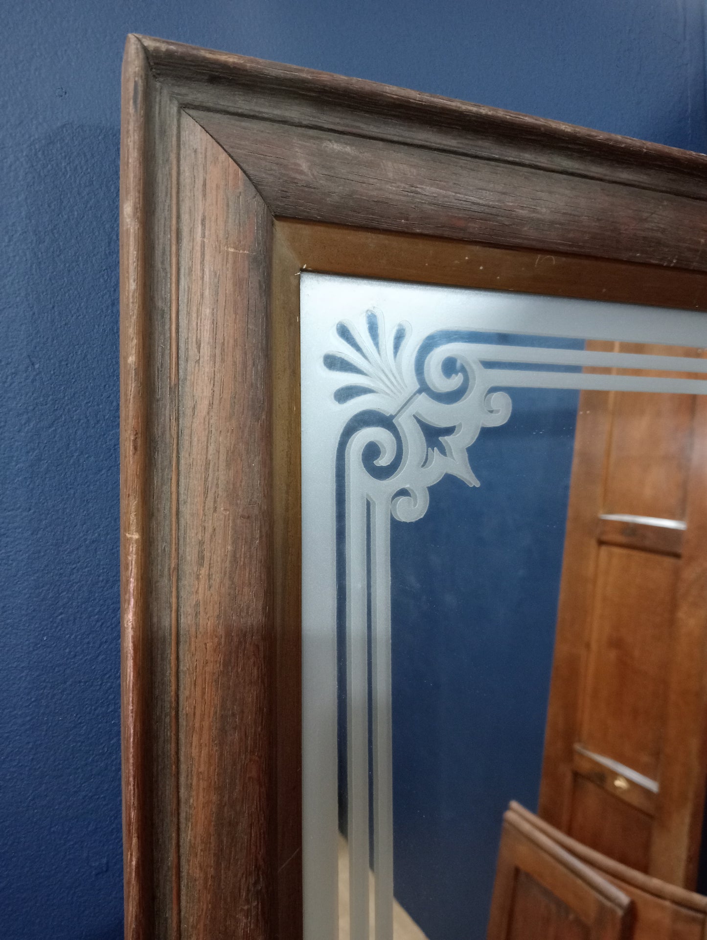 Etched wall mirror in oak frame