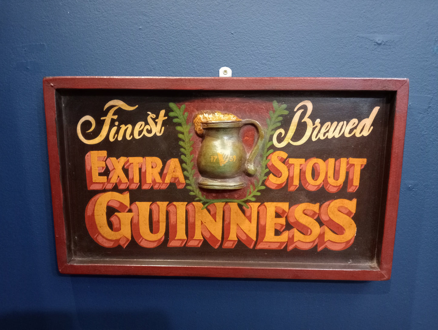 Finest brewed extra stout Guinness board