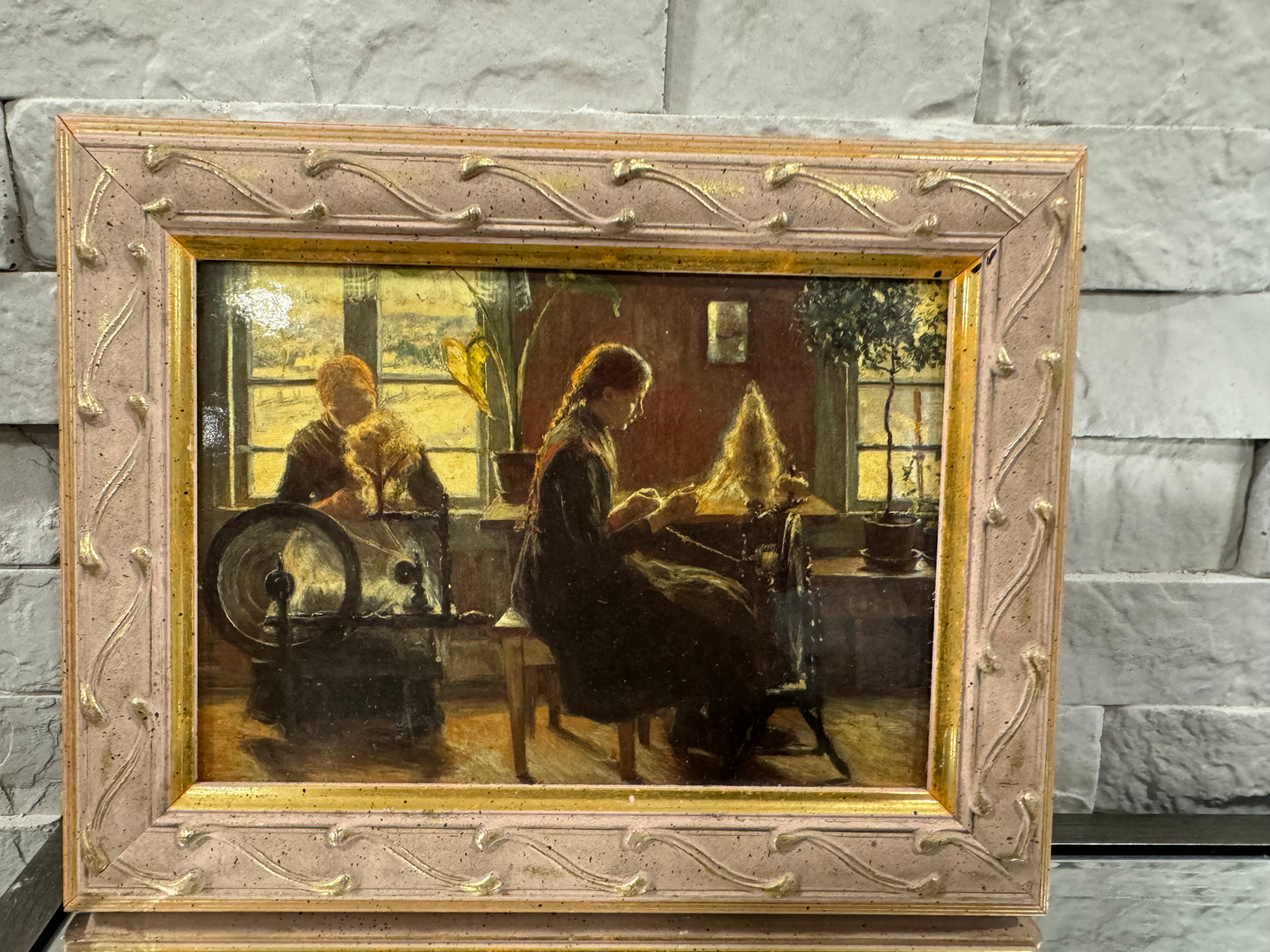 Framed women weaving picture