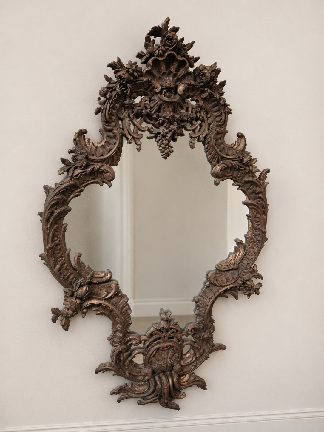 Giltwood rococo style carved mirror