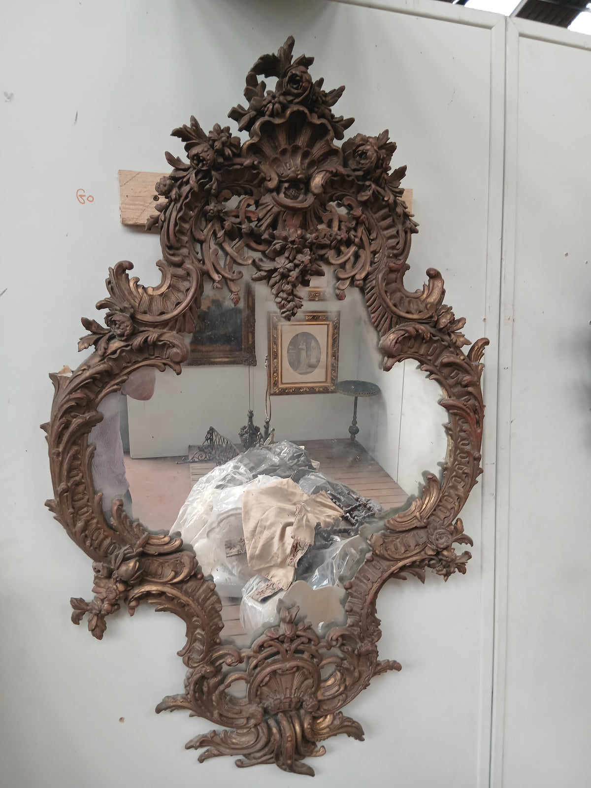 Giltwood rococo style carved mirror