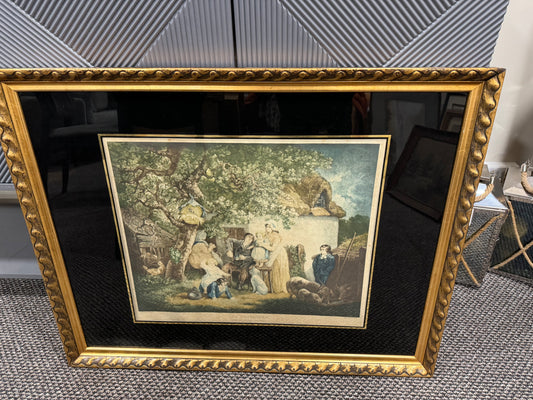 Gold frame print of family