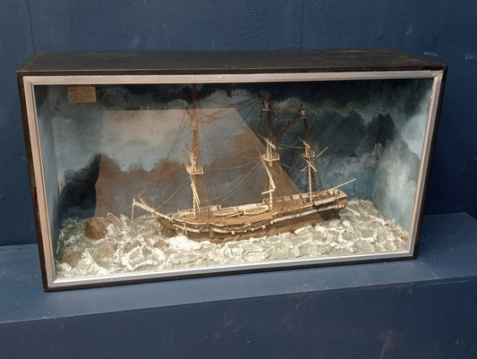 H.M.S Pegasus wreck off Nova Scotia September 1806 in glazed showcase