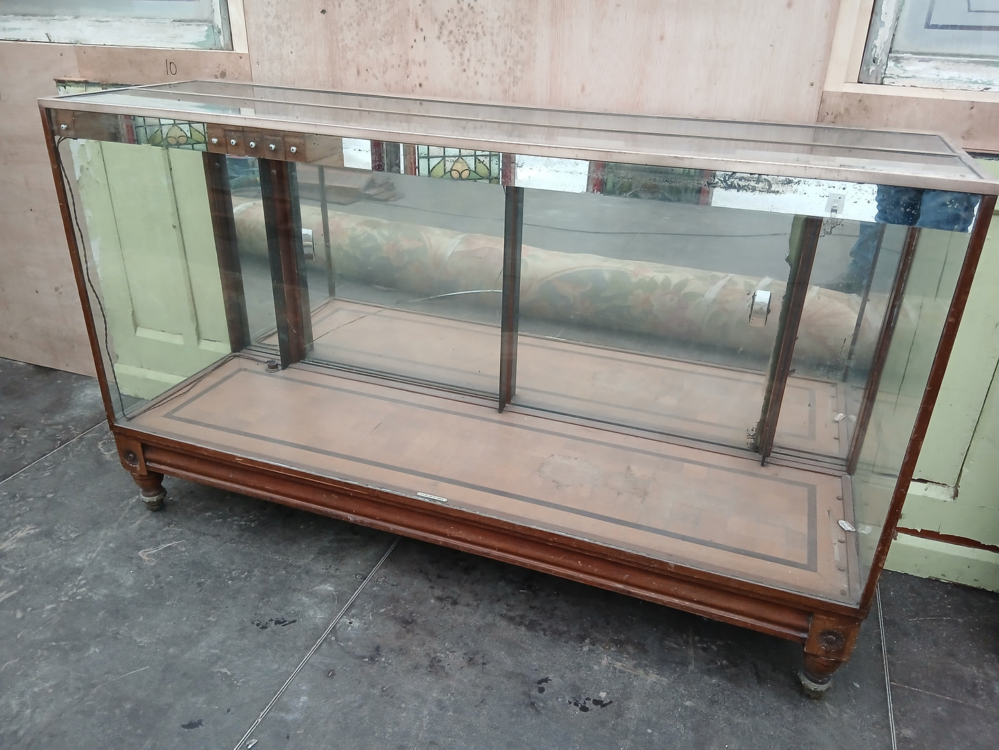 Haberdashery shop cabinet(A.H.Bex Ltd - Dublin) brass surround mirrored back