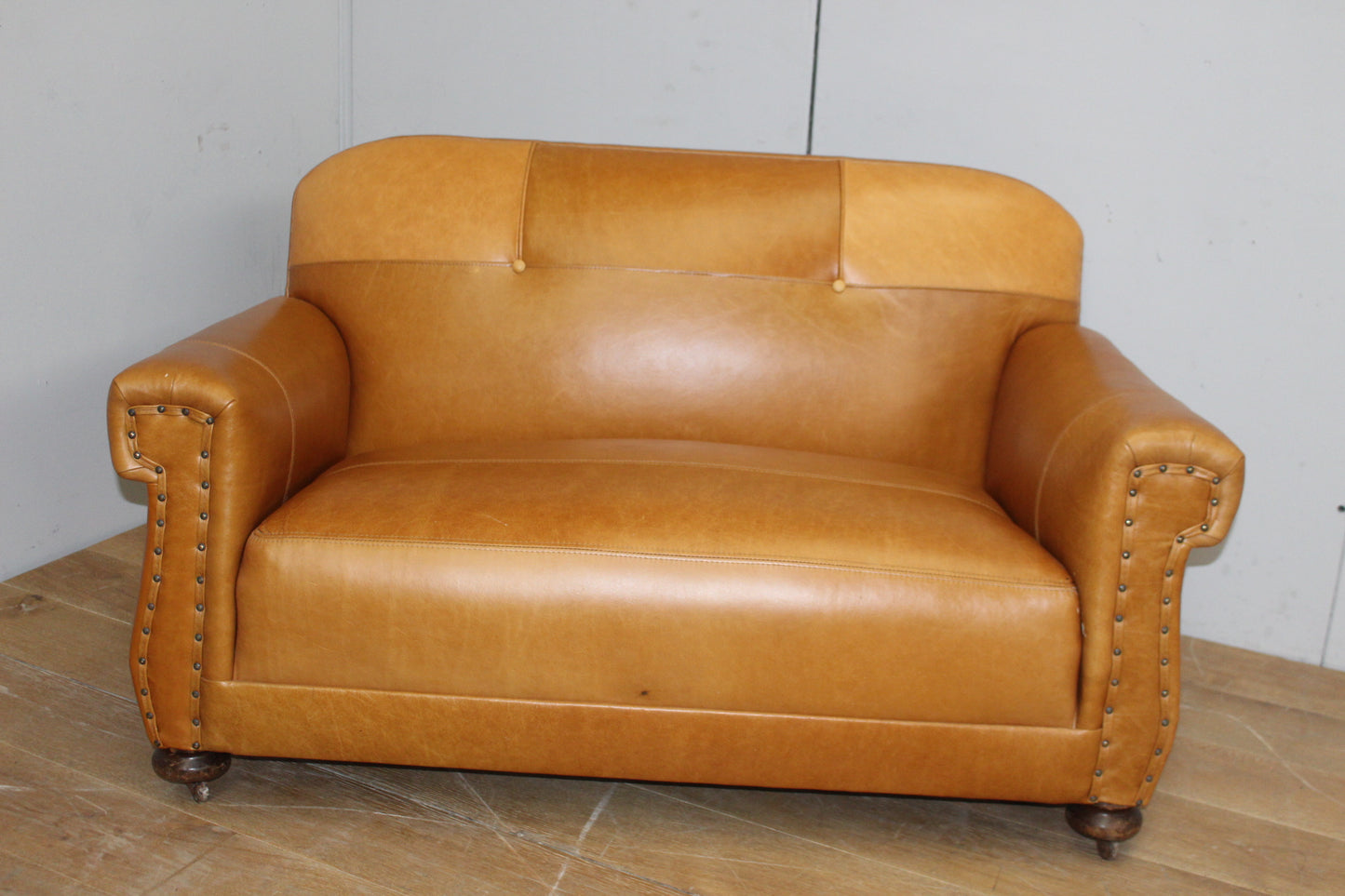 Hand dyed Leather upholstered club sofa