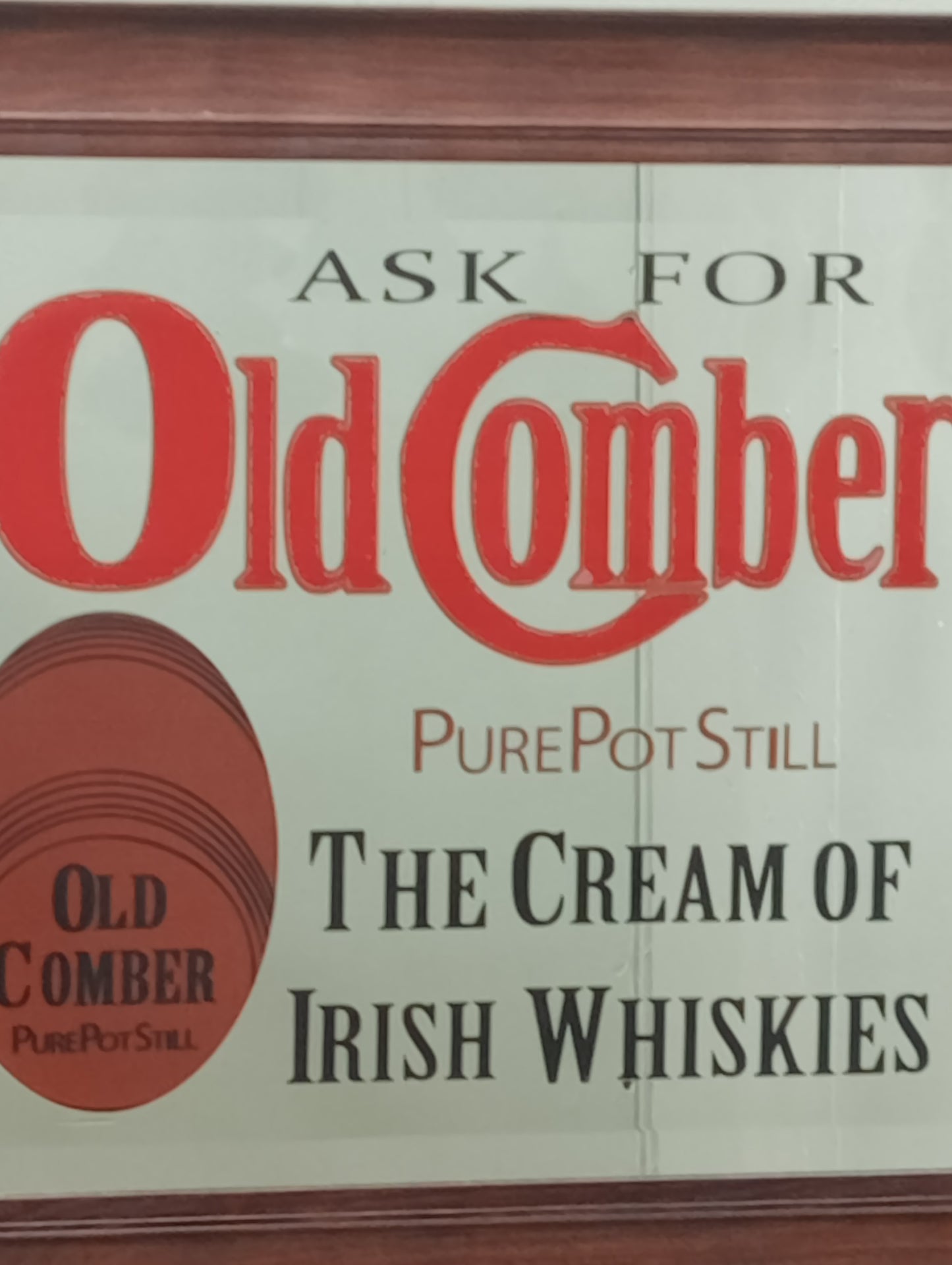 Ask for old Comber pure pot still the cream of Irish whiskies bevelled advertising mirror