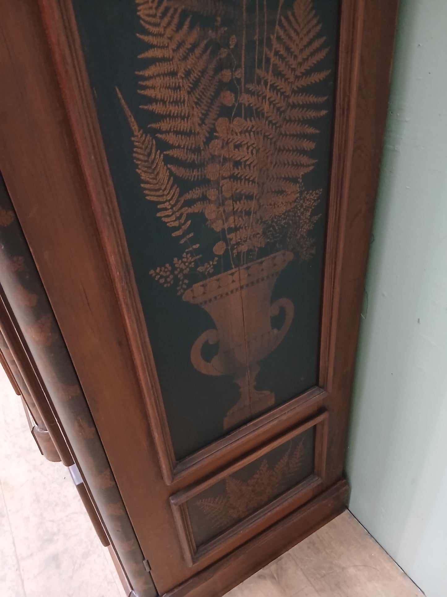 Irish George III style triple fern ware wardrobe with 2 doors to each side internal brass clothes rail central pane; with dome topped mirror, drawer to base