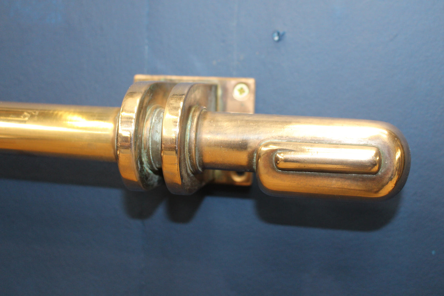 Brass door handle with bronze mount