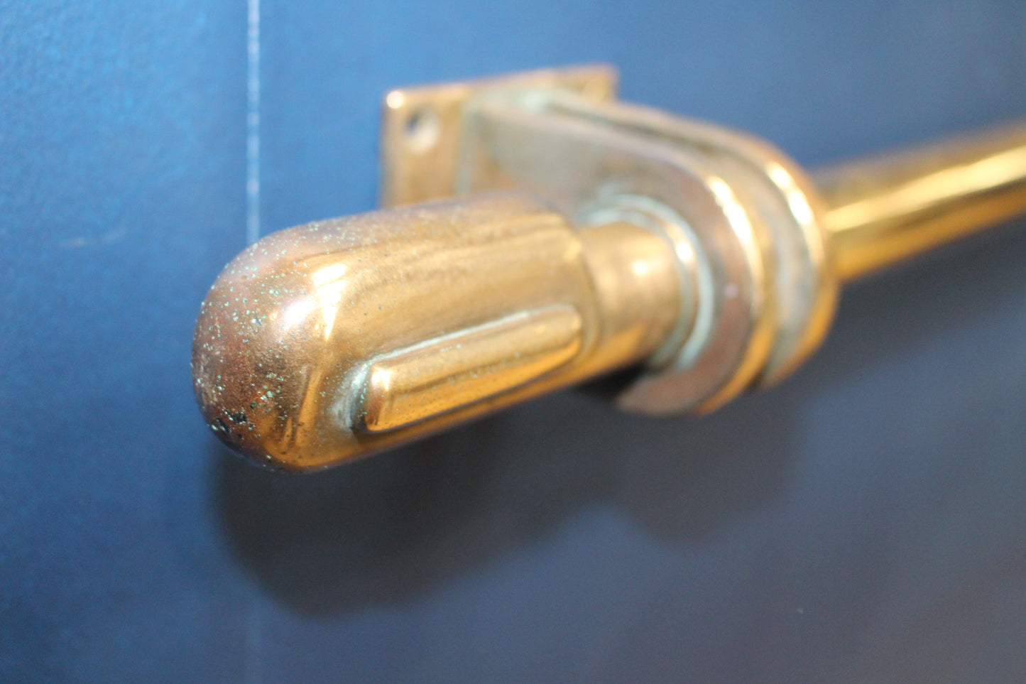 Brass door handle with bronze mount