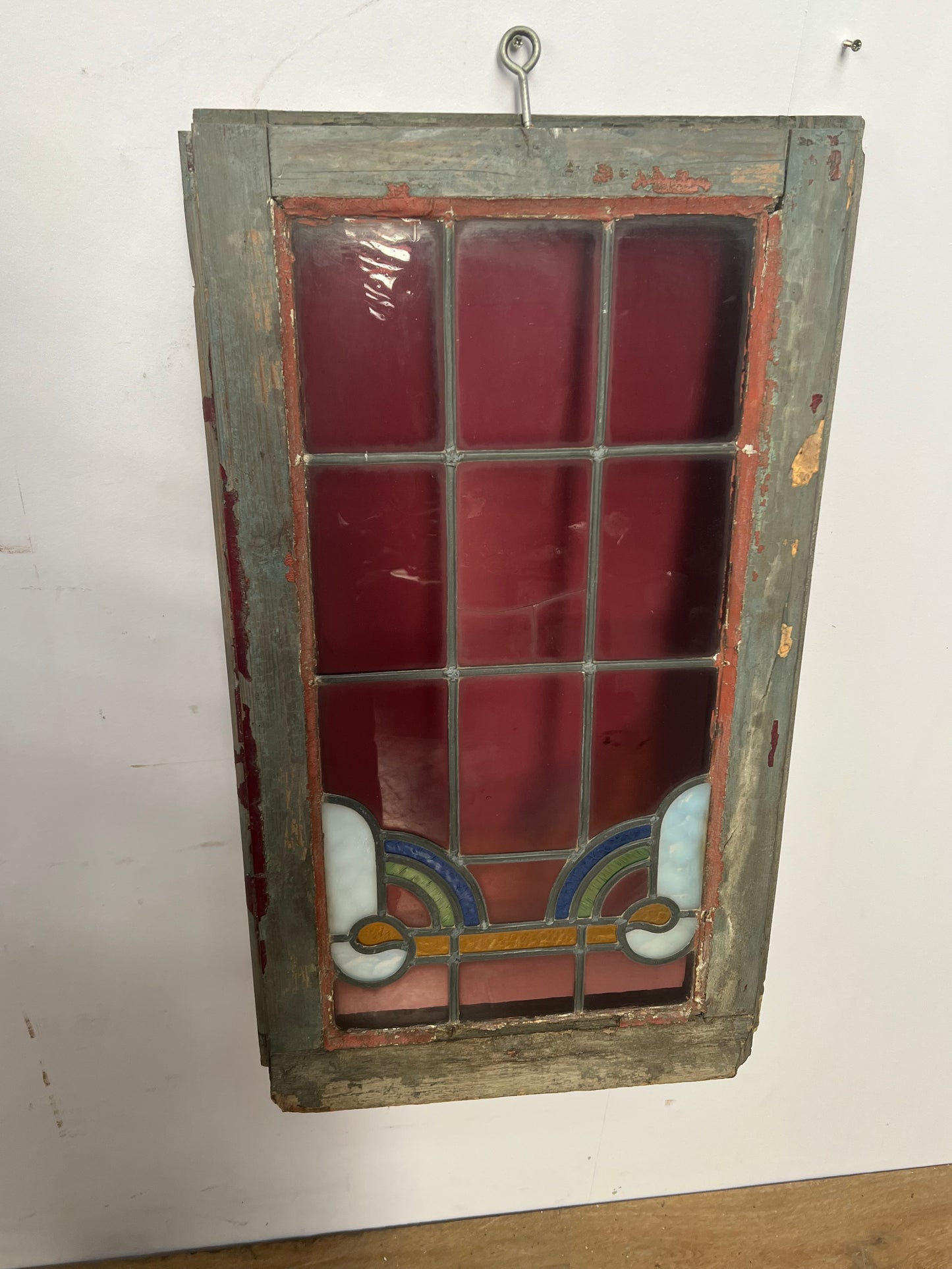 Leaded glass window in wooden frame