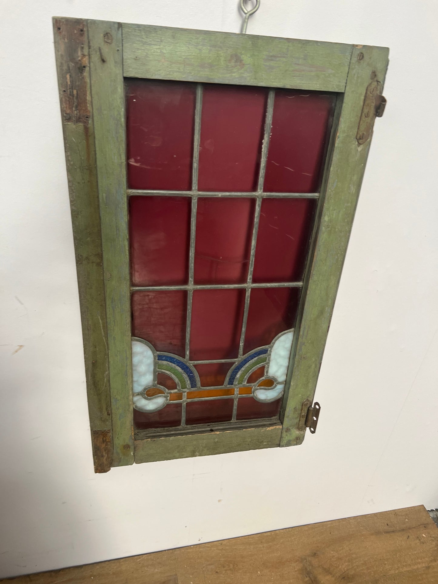 Leaded glass window in wooden frame