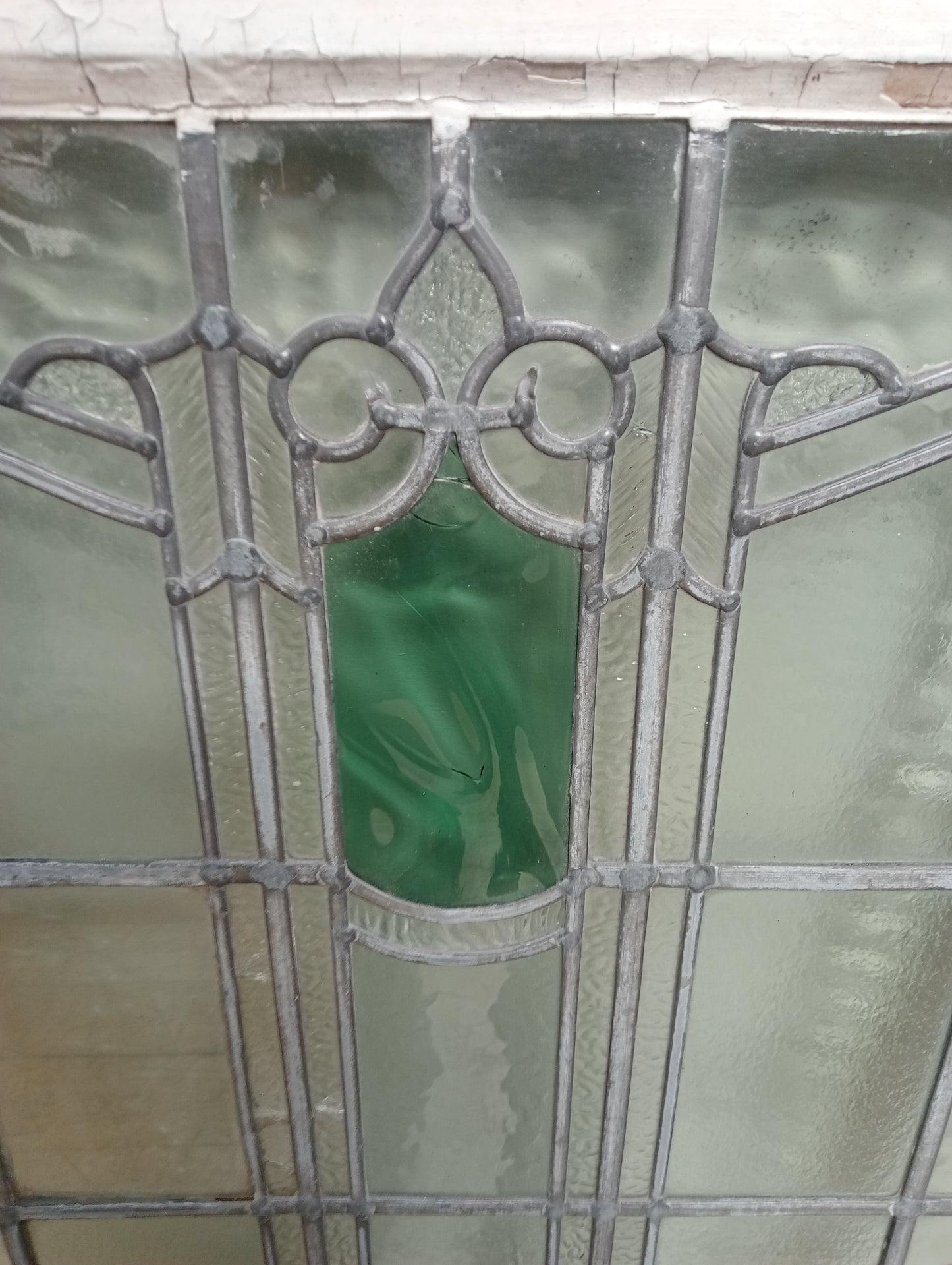 Leaded stained glass window green panel