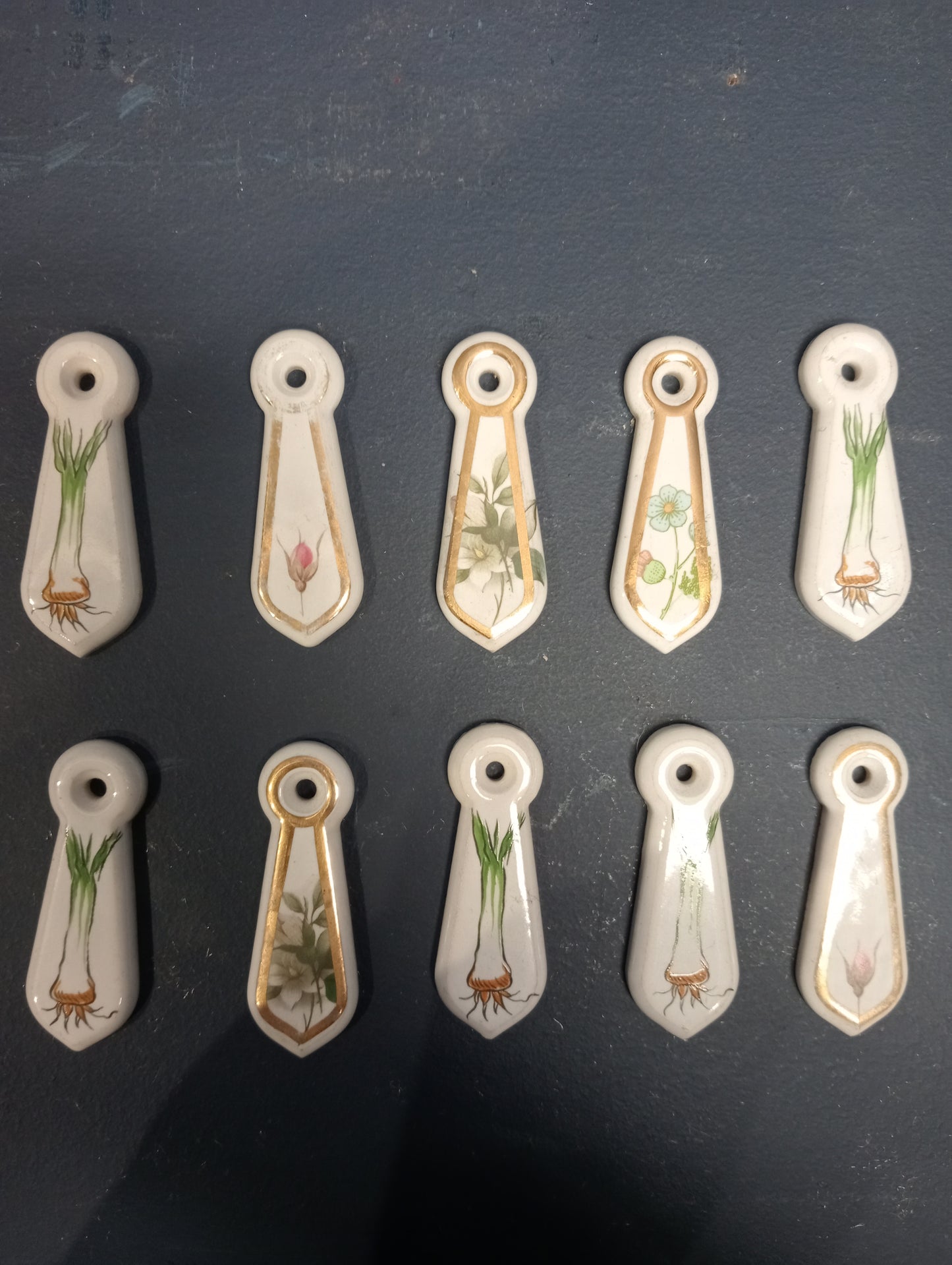 Lot of 10 ceramic keyhole covers A