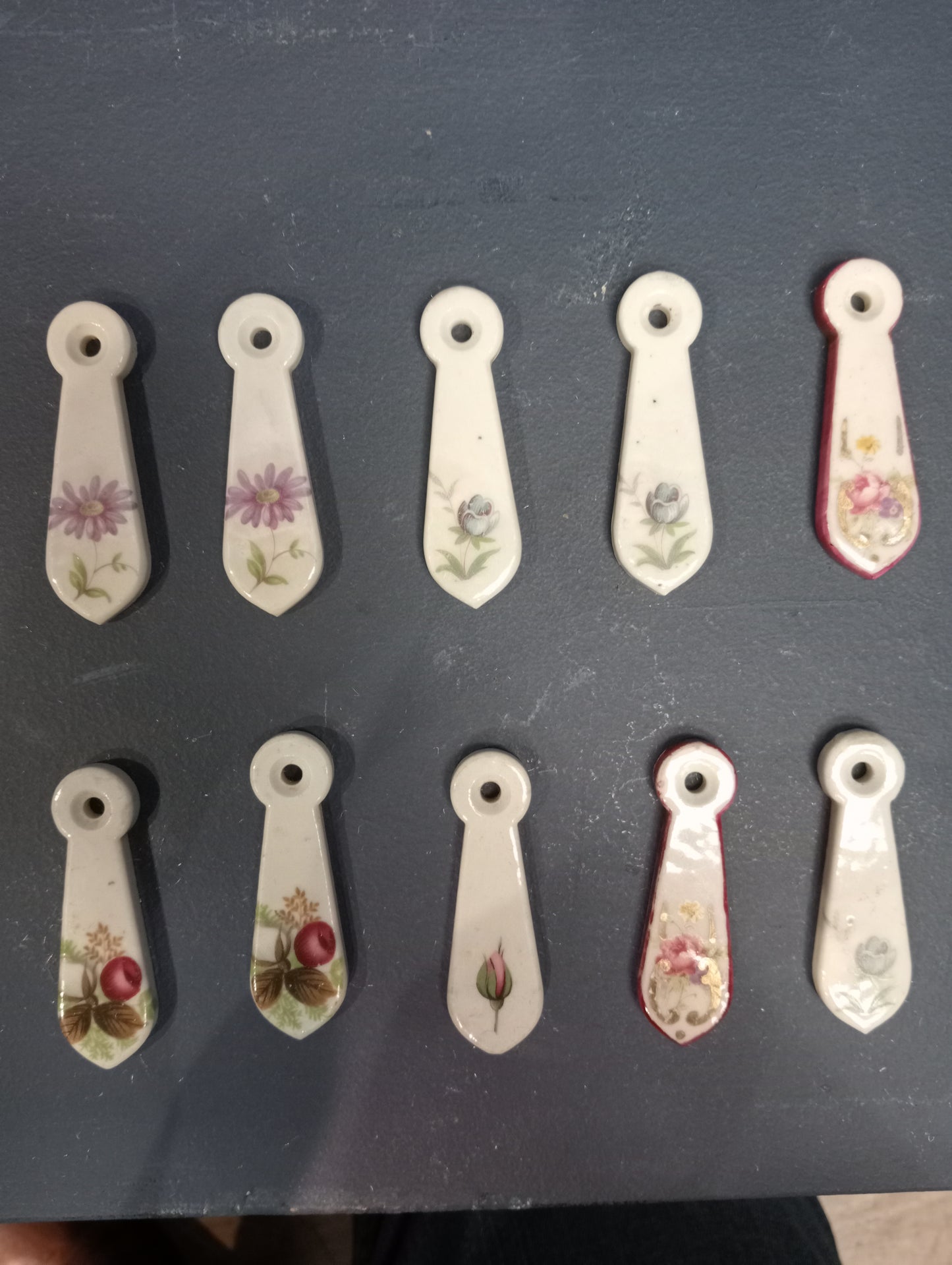 Lot of 10 ceramic keyhole covers B