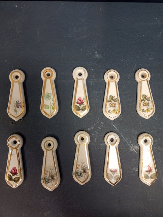 Lot of 10 ceramic keyhole covers C