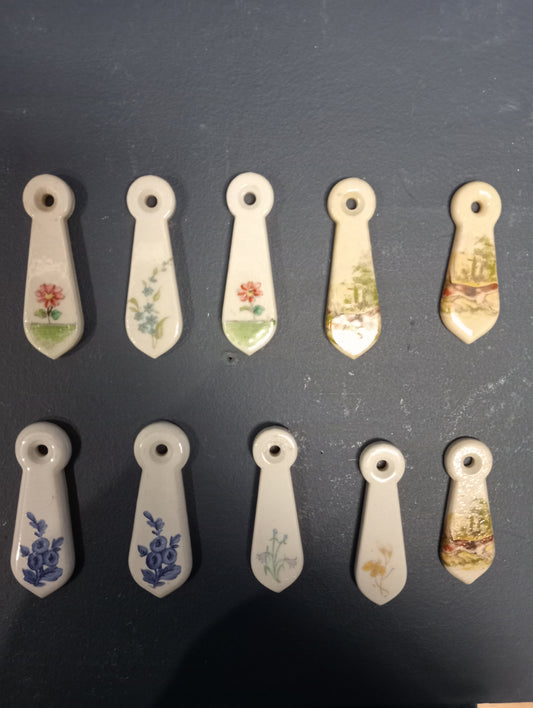 Lot of 10 ceramic keyhole covers