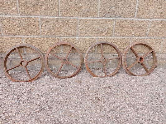 Lot of 4 cast iron shepard hut wheels