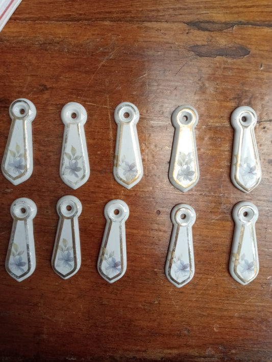 Lot of 5 pairs of ceramic keyhole covers E